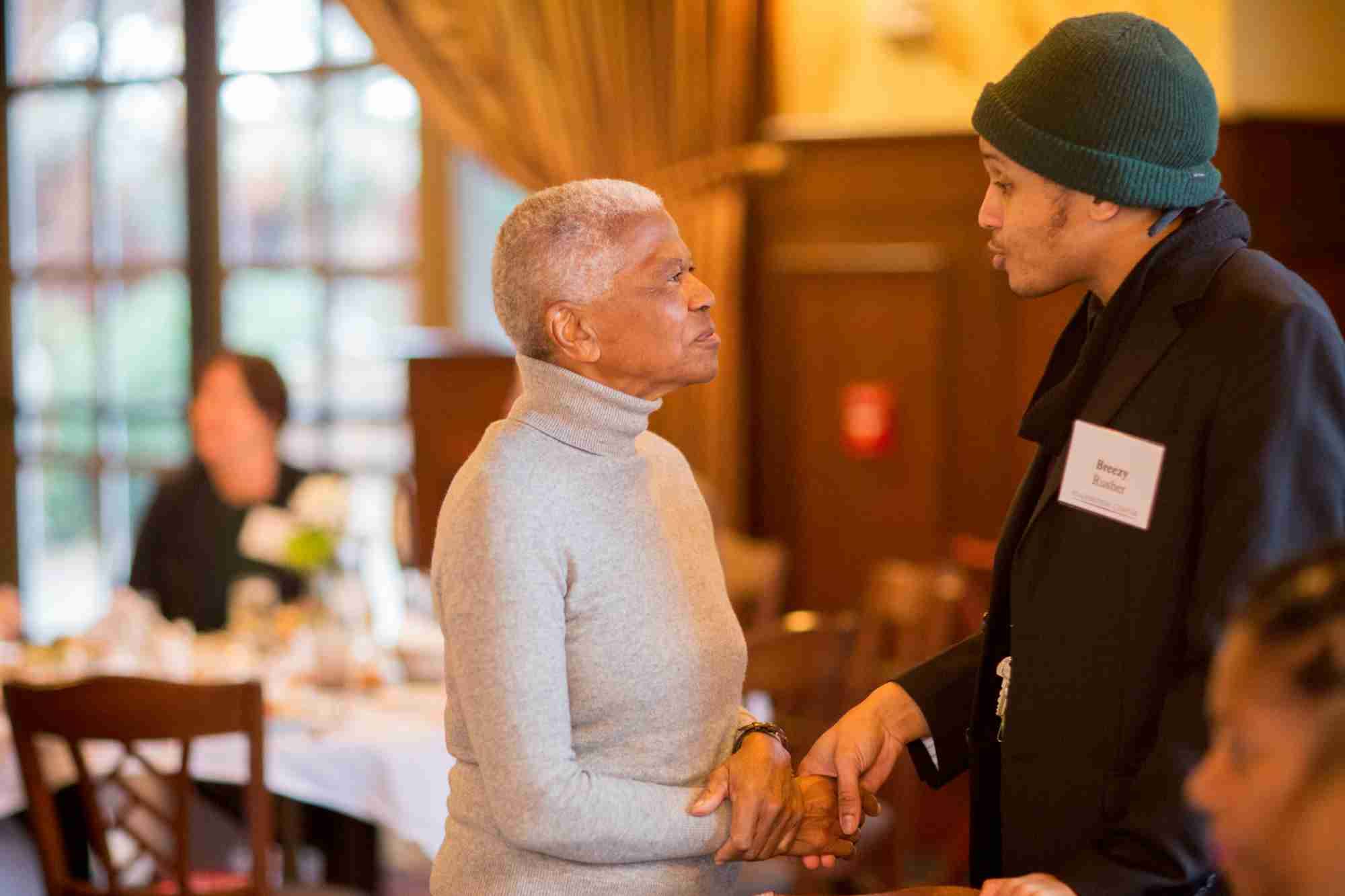 Mary Frances Berry chats with a participant